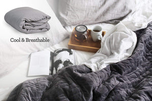 Are weighted blanket too hot? Not with our breathable cotton fabric! Image shows the Calming Blanket on a bed.